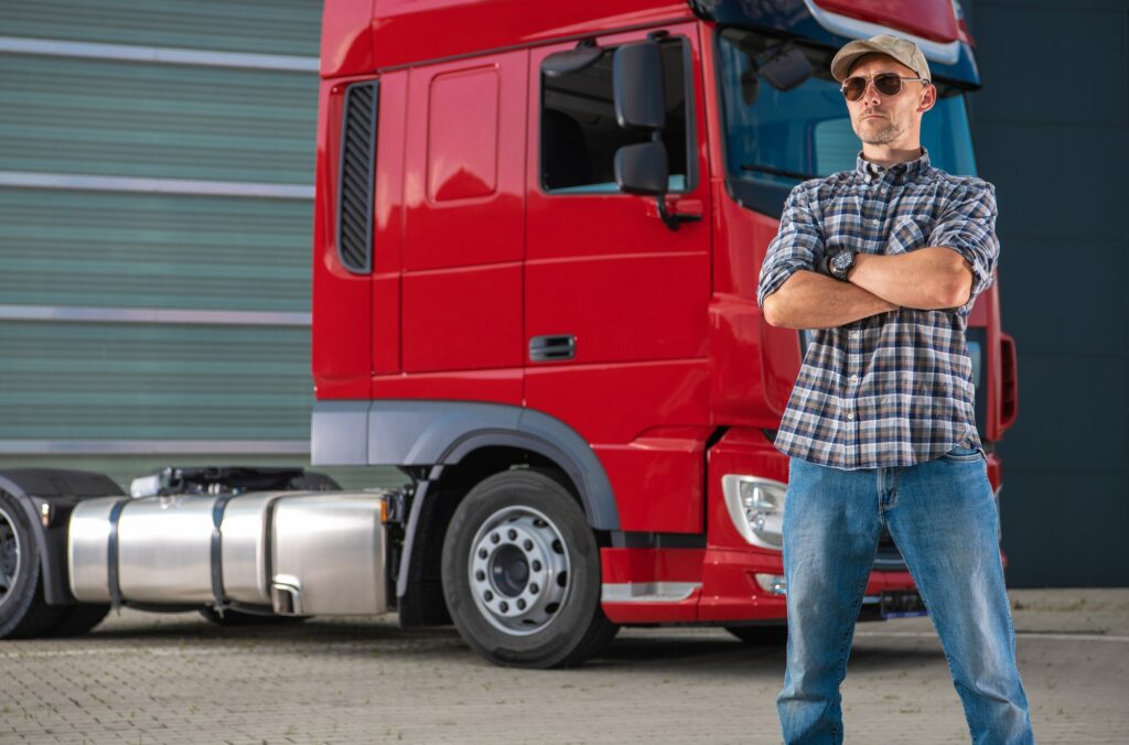 Professional Semi Truck Driver and His Heavy Duty Vehicle